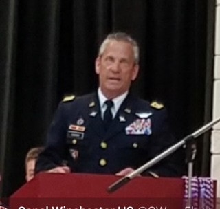 Pat Durbin speaking on stage